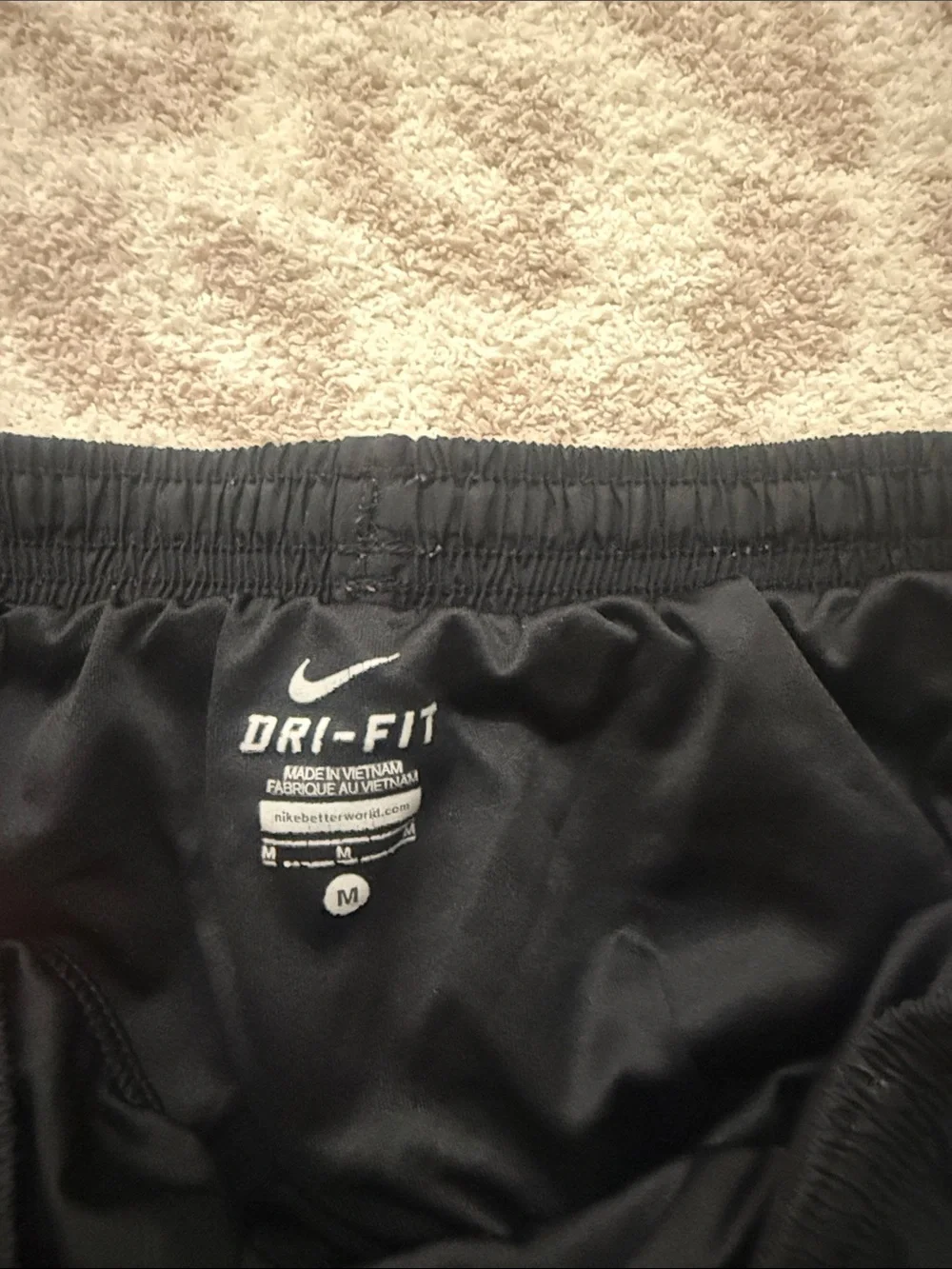 Nike Women’s Black Running Shorts with Pink and Blue Piping
